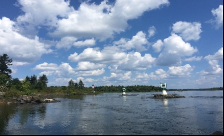 channel markers on a lake 